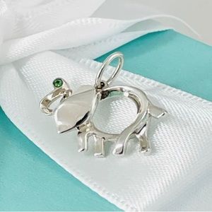 Authentic Tiffany & Co Elephant Pendant 925 sterling silver & garnet